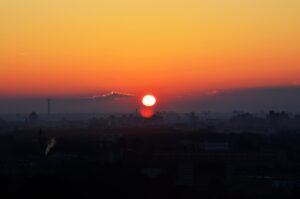 city skyline during orange sunset