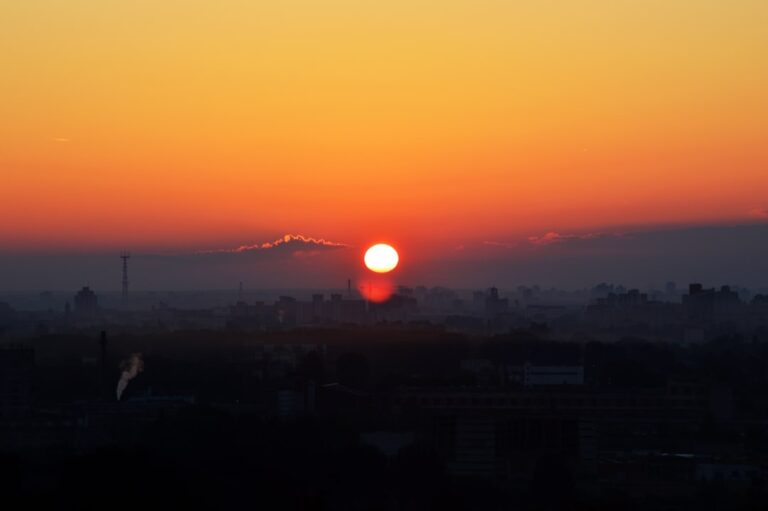 city skyline during orange sunset