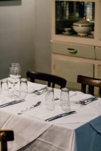 An old fashioned table setting in an Italian trattoria