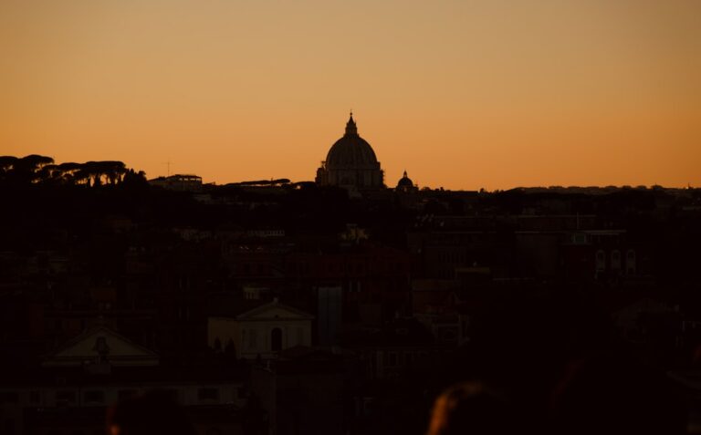 silhouette of building during sunset
