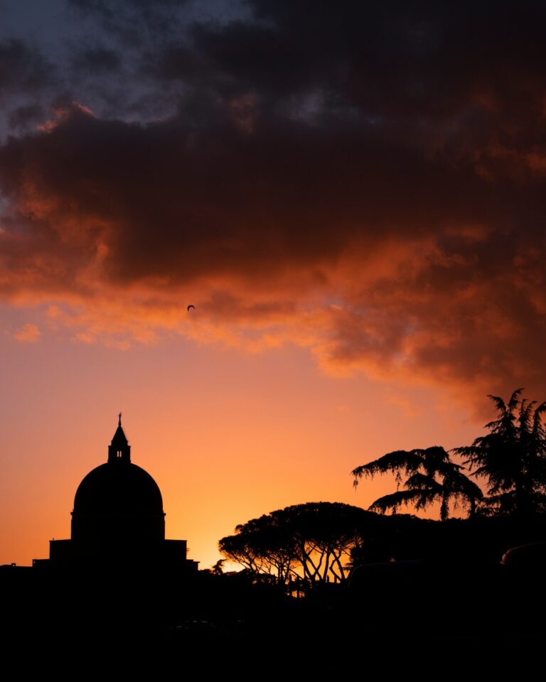 silhouette of building during sunset