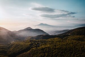 a landscape with hills and mountains