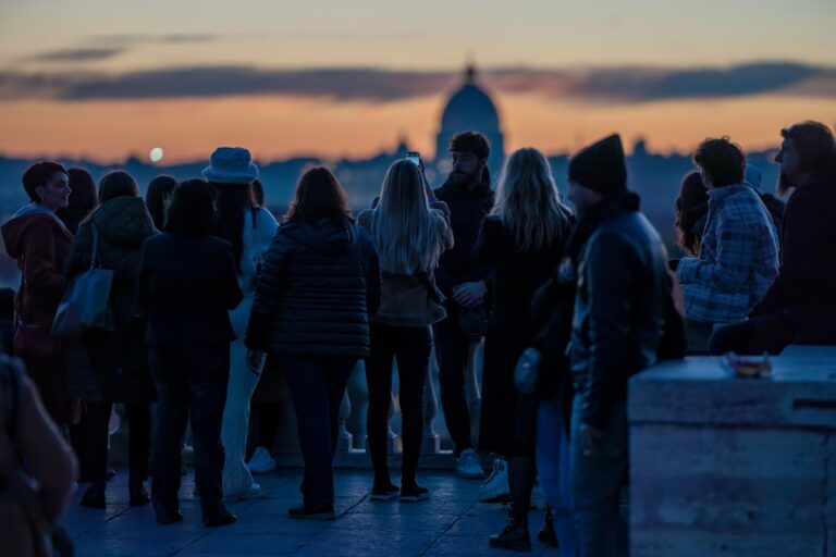 People gathering to watch the sunset in Rome, Italy from the Pincio.