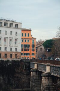a bridge with a building in the background