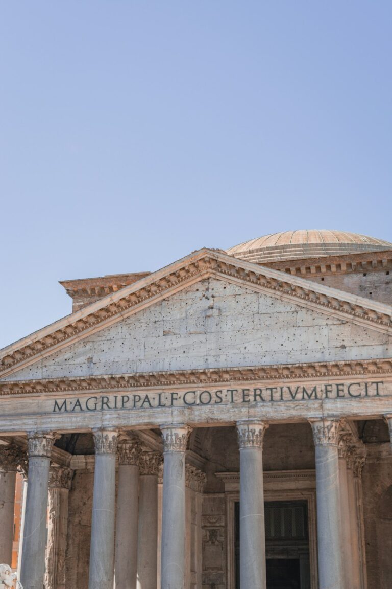 a large building with columns and a dome