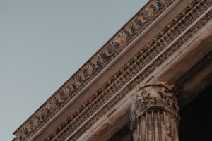 a close up of a building with a clock on it