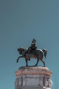 a statue of a man riding a horse