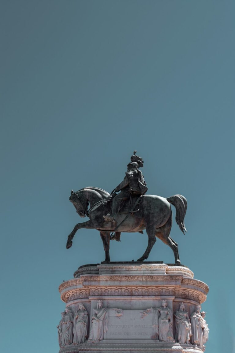 a statue of a man riding a horse