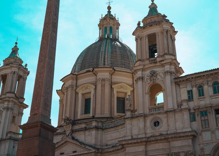 a tall building with a clock on the top of it