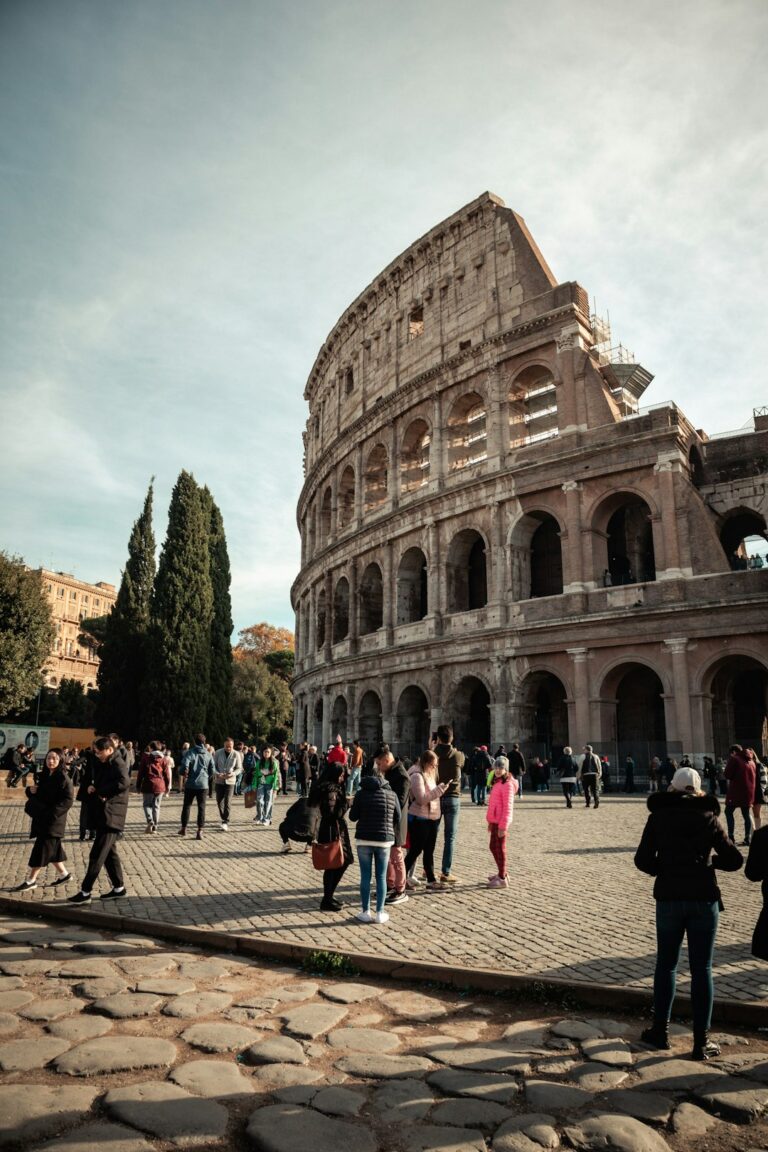 a group of people standing around a building