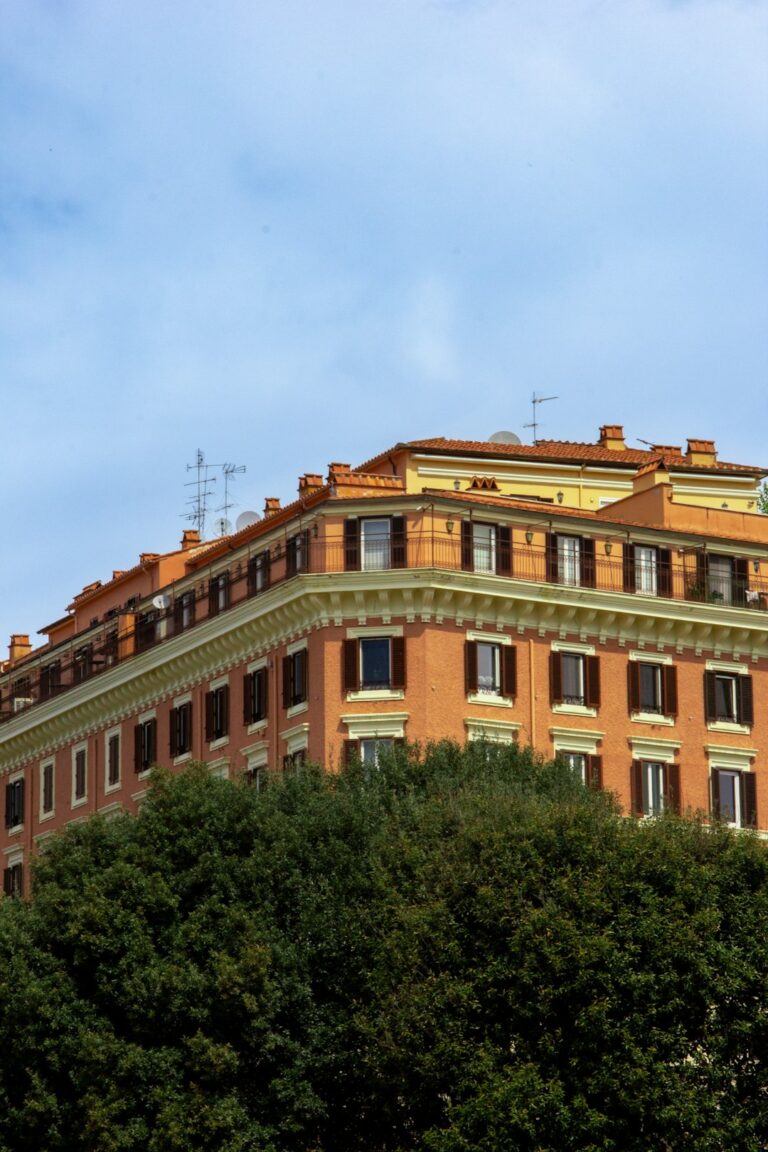 a tall building with a clock on the top of it