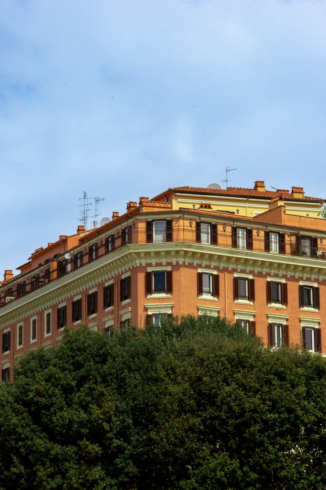 a tall building with a clock on the top of it