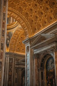 the ceiling of a building with a painting on it