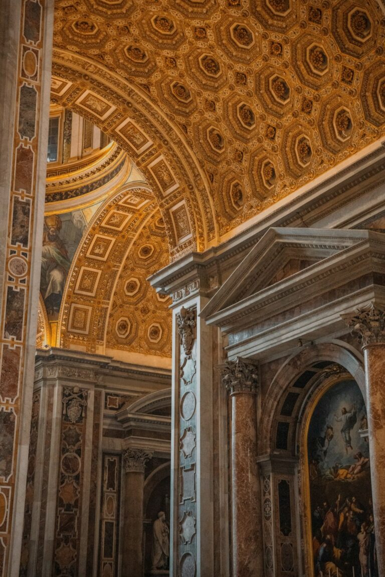 the ceiling of a building with a painting on it