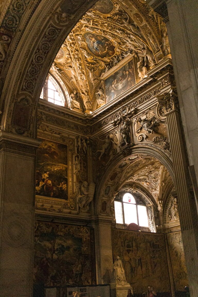 A large cathedral with a painting on the wall