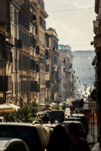 Golden sunlight shining on a street in Rome.