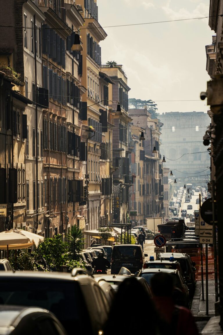 Golden sunlight shining on a street in Rome.