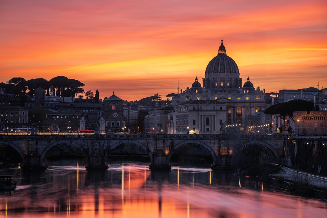 A view of a city with a bridge and a building in the background