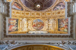 Ornate ceiling inside a historic building.