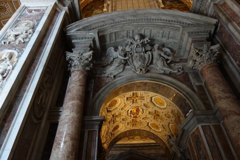 Ornate architectural details with marble columns and carvings.